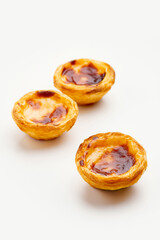 Traditional Portuguese egg tart dessert Pasteis Pastel de nata or Pasteis de Belem on white background
