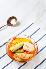 Asinan Buah or Indonesian pickled mixed fruits, spicy sweet and sour taste. with copy space. perfect for recipe, article, catalogue, or any commercial purposes.