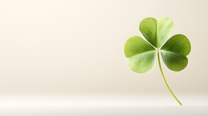 Textured green four-leaf clover, illustrated in sharp detail, resting on a neutral pale background, symbol of good fortune and nature