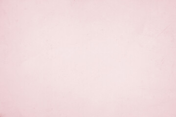 A vintage pink paper texture background with a grunge feel, perfect for art and design projects.