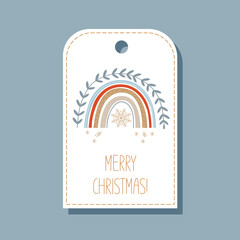Christmas cute label design with holiday boho rainbow, and lettering Merry Christmas.