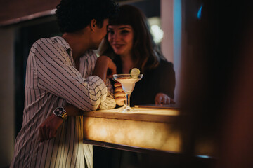 Two people sharing a fun and engaging conversation over drinks at a lively bar. Ideal setting for a...