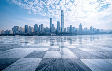 Obraz na płótnie Canvas Empty marble floor reflecting modern city skyline with blue sky