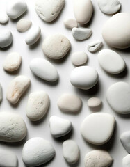 white pebbles on a white background, close-up.