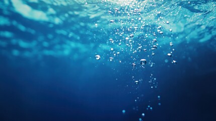 Obraz premium Air Bubbles Rising in the Blue Ocean