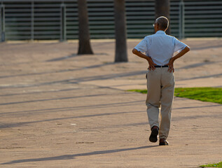 old man walking in the park