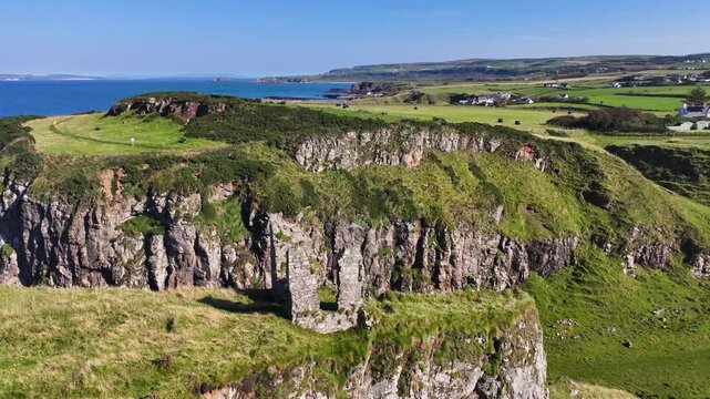 Aerial view of the Dunseverick Castle on the Co Antrim coast by the Atlantic Ocean Northern Ireland