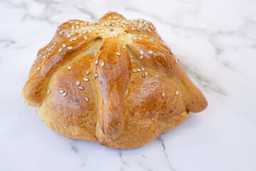Pan de Muerto on Marble Surface