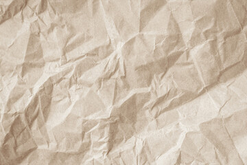 Crumpled brown paper texture background for design with copy space for text or image.
