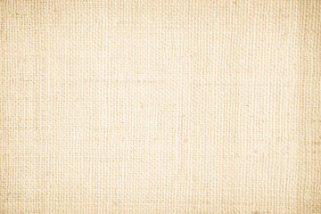 Fototapeta premium Closeup detail of beige fabric texture background. High resolution photo.
