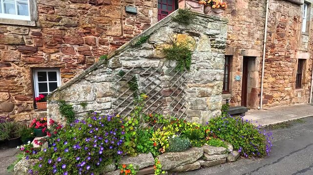 Charming Stone Building with Flowers
