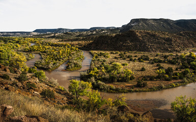 Rio Chama River flooded after rain in the Abiquiu Valley Mountains, New Mexico, USA