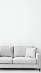Modern gray sofa against white background.