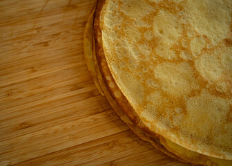 crepes on wooden board