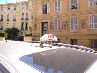 a taxi lightbox above head in Monaco France