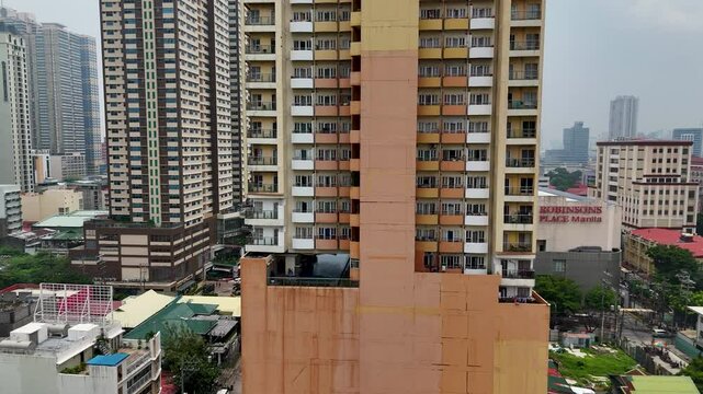 High-rise residential buildings in Malate, Manila, surrounded by urban structures. Manila, Philippine