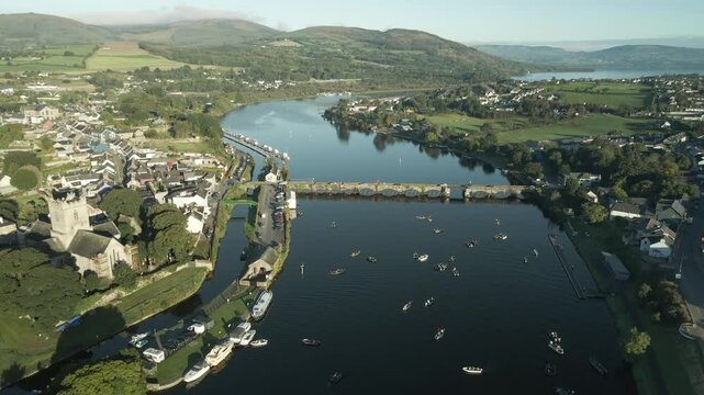 Fishing boats fill the calm river in Killaloe town during a fishing competition in Ireland