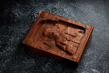 The Christian icon is made of solid wood by the milling method. Church equipment. Greeting card for the Ascension of Jesus Christ. Background for Christmas card.