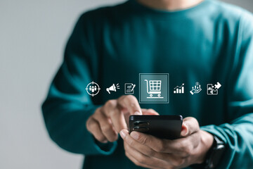 Ecommerce online shop concept, ecommerce store, online business Businessman using smartphone with ecommerce and online store icon on virtual screen.