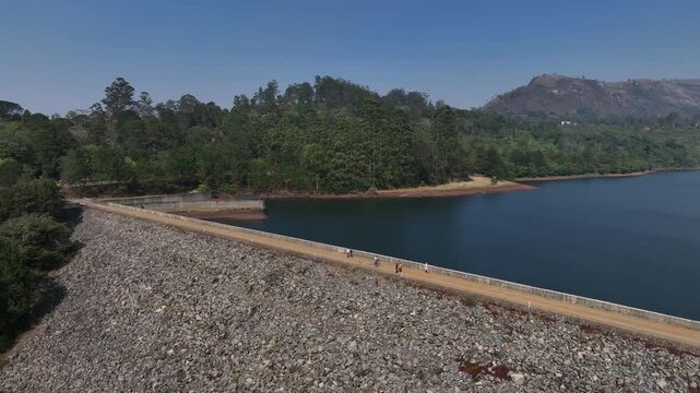 Pan left aerial view of Mulunguzi Dam in Zomba city, Malawi.