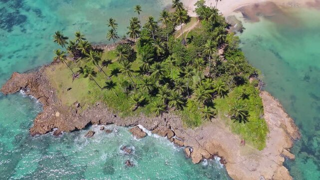 Los Coquitos rocky coast, Nagua in Dominican Republic. Aerial top-down ascending