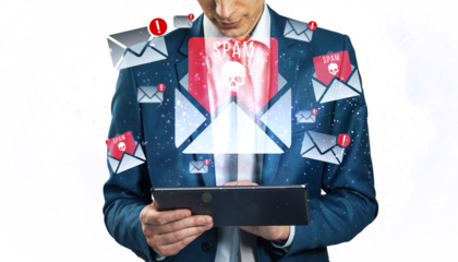 Businessman using a tablet surrounded by spam emails icons