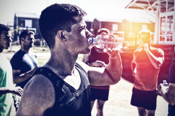 Men drinking after the effort