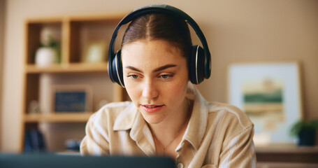 Remote work from home, pc and woman with headphones, listening to music and connection. Person,...