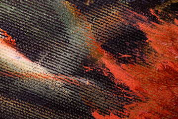 Monochrome linen texture. Strokes of oil paint on a textured canvas. The concept of the modern school of art. Background on a military theme with red and yellow elements.