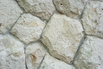 Big piece stones wall in gray color. Background and texture.