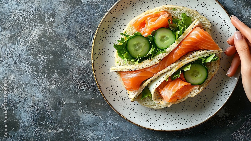 Poster wrap sandwich roll with salmon cucumber salad on a white plate blue background top view : generative