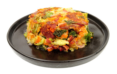 Portion of bubble and squeak a traditional British comfort food made with fried potatoes, cabbage and various left over food ingredients