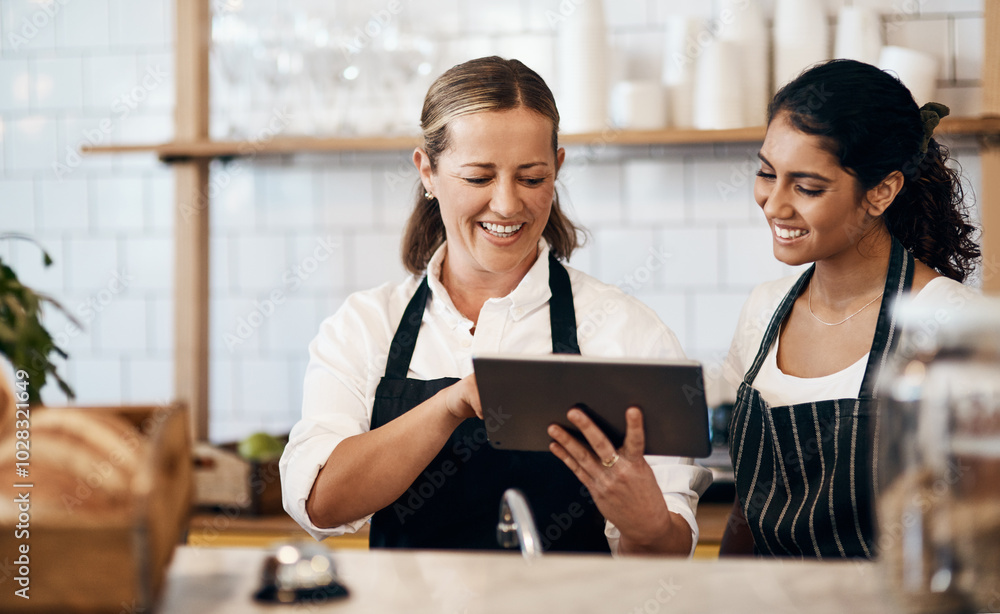 Wall mural Business women, cafe and bakery with tablet for online service, order or review at indoor restaurant. Young, female people or waitress with smile on technology for revenue or profit at coffee shop