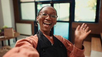 POV zero waste storekeeper creating marketing video for social media, presenting additives free...