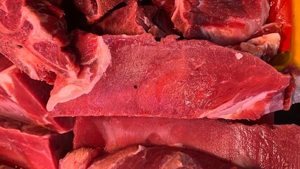 Fresh meat for sale in the meat market.Fresh Beef Mutton lamb for sale in a butcher shop.Meat on the stall. selling meat, pork, fish in local  traditional market. traditional butcher stall.