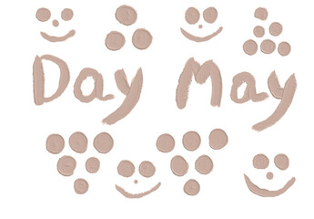 Creative display of playful smiley faces and the words Day May in soft beige paint on a white background