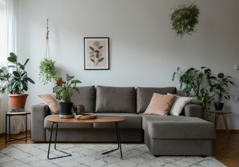 Modern minimalist living room with cozy grey sofa and indoor plants