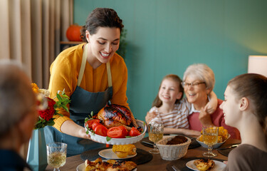 Family celebrating Thanksgiving Day
