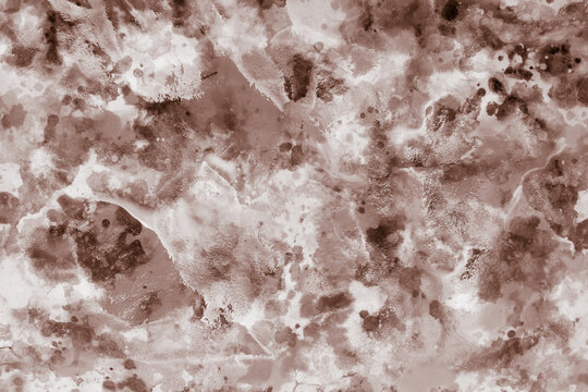 Unusual patterns of watercolor monochrome paints, on a wet sheet of paper, in the artist's studio. Beautiful background for your creative design or illustrations.