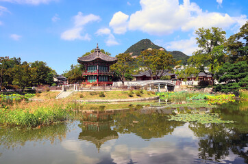 Beautiful landscape with ancient pavilion, mountains and lake. Hyangwonjeong Pavilion in the pond in the garden, Gyeongbokgung palace, Seoul, South Korea