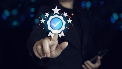 Businessman holding and showing the best quality assurance with golden five stars for guarantee product and ISO service concept.