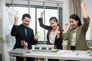 Real Estate Project Sales Team Celebrates Successful Marketing Plan in Modern Office Setting