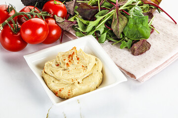 Creamy hummus in the bowl