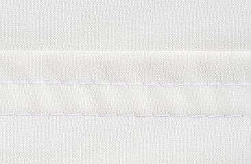 Twin needle stitching background on white thread and material