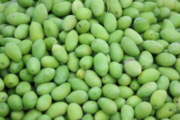 closeup of green olives on the market