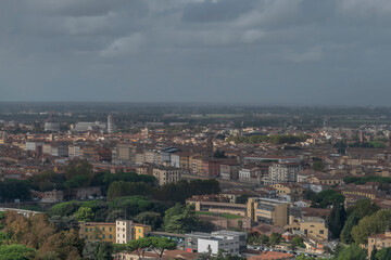 Fototapeta premium Aerial view of the center of Pisa, Italy, under a very cloudy sky