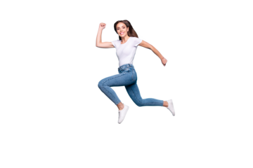 Full body photo of charming sporty lady running training jogging wearing white t-shirt denim jeans isolated over blue background