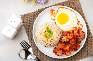 Pinoy Bacsilog Breakfast Meal – Bacon, Sinangag (Fried Rice) and Egg 