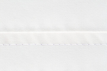 single needle stitching background on white thread and material