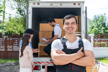 Portrait of Caucasian delivery man delivering package to the house. 